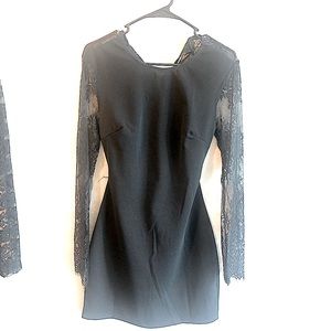 Black long lace sleeve dress with sexy Backless lower back moment size 4